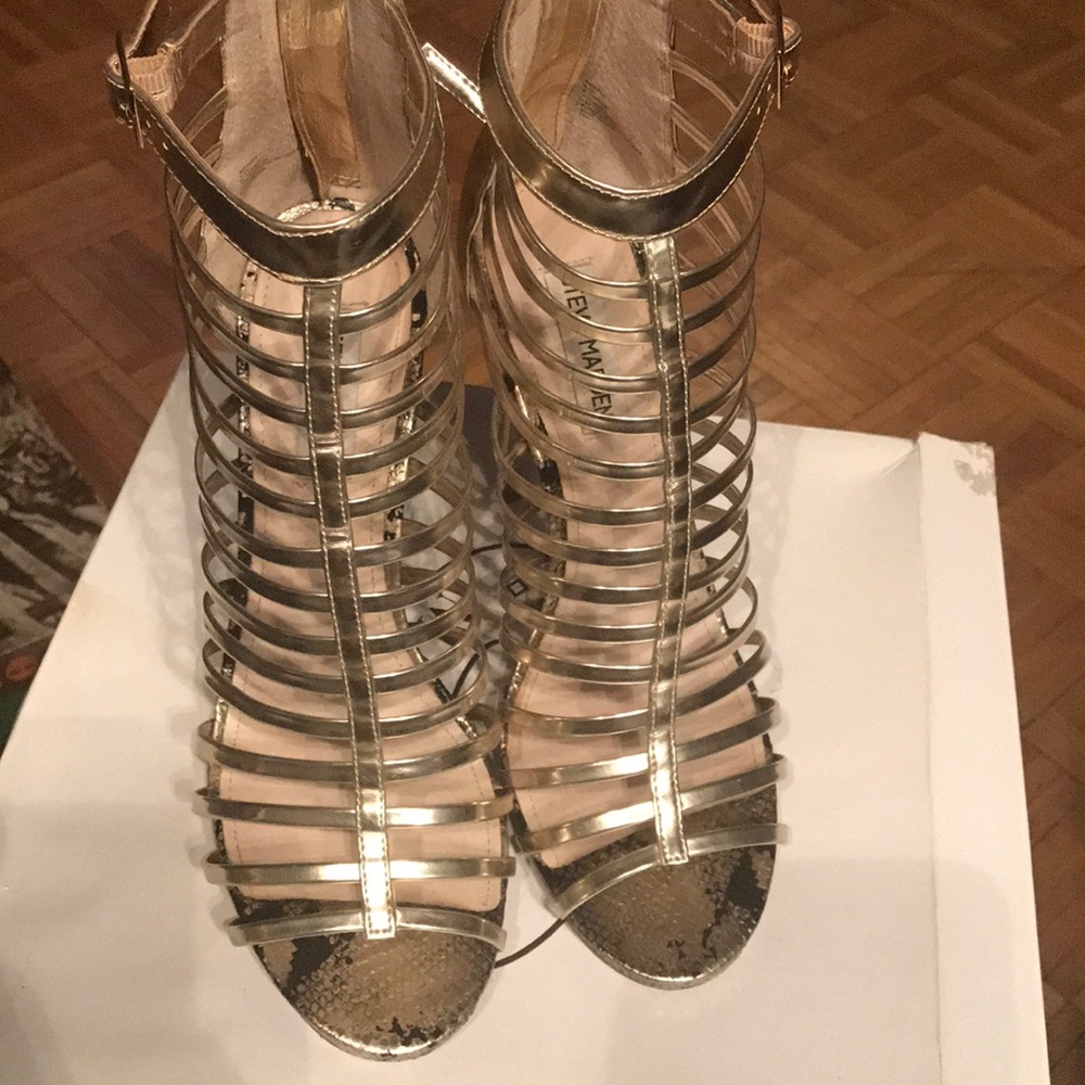 Cage gold heels!